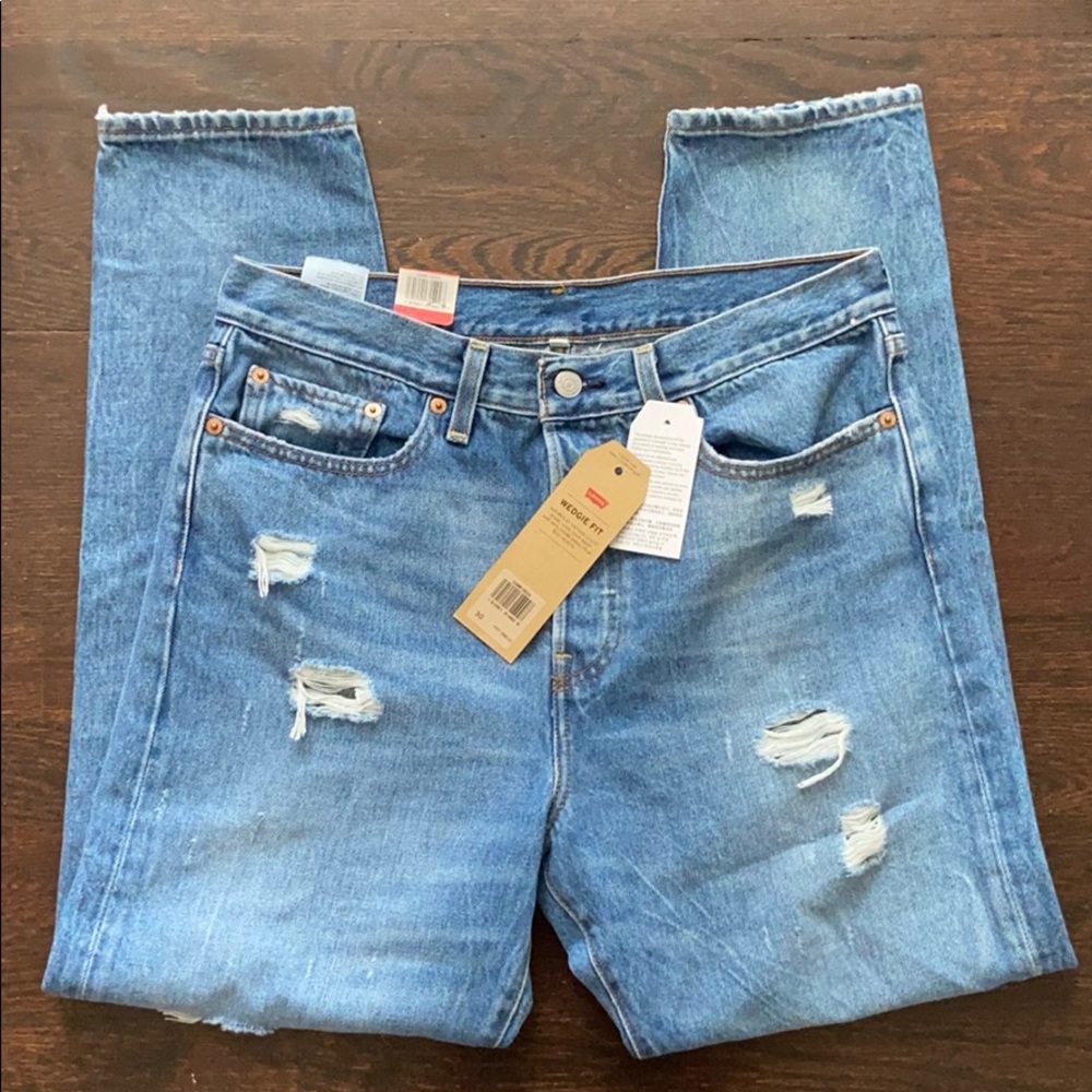 WEDGIE FIT LEVIS: high rise with a tapered leg
